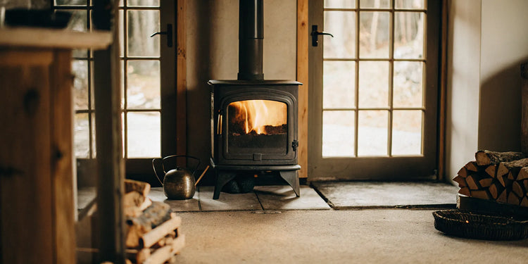 A fire burning in a wood stove using a catalytic combustor for clean, efficient heat.