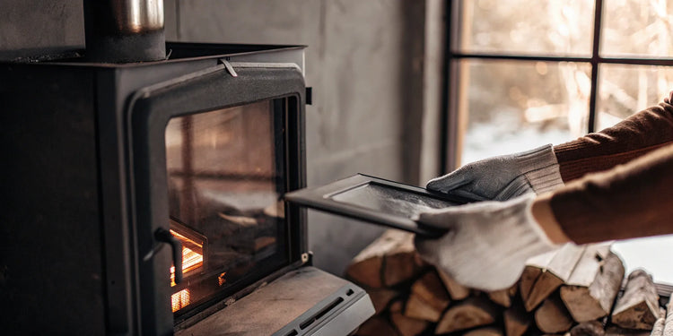 Replacing the old glass gasket on a pellet stove door.